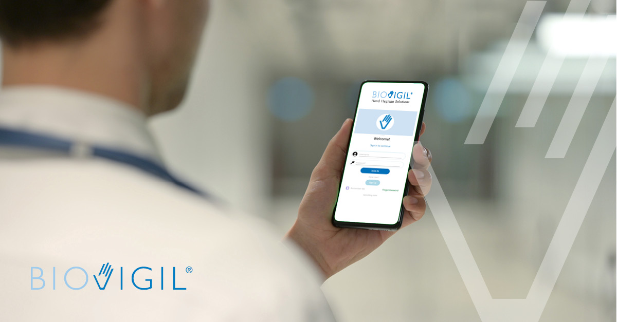 Doctor looking at mobile phone with BioVigil app.